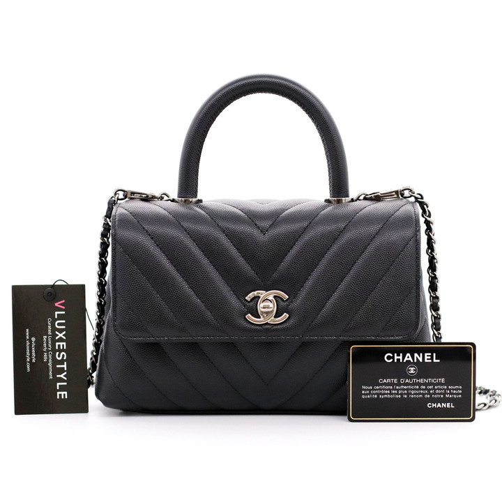VAN CLEEF 
ARPELS Chanel Mini Coco Handle 19K Black Chevron Caviar with shiny ruthenium hardware 