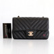 VAN CLEEF 
ARPELS Chanel Classic Mini Rectangular 18B Chevron Caviar with light gold hardware 