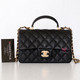 CHANEL Chanel Mini Rectangular with top handle 21S Black Quilted Caviar with brushed gold hardware 