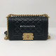 Trade with Wallet on Chain Boy with our Le Boy Black Caviar Small with gold hardware