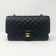 Chanel Classic Medium Double Flap Black Quilted Caviar with gold hardware