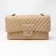 VAN CLEEF 
ARPELS Chanel 19S Medium Matte Beige Chevron Caviar with light gold hardware 