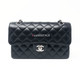 VAN CLEEF 
ARPELS Chanel Classic Small Black Caviar Double Flap with silver hardware 
