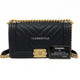 VAN CLEEF 
ARPELS Chanel 18K Le Boy Old Medium Black Chevron Caviar with brushed gold hardware 