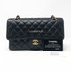 VAN CLEEF 
ARPELS Chanel Classic Black Medium Double Flap Caviar with gold hardware 