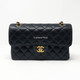 VAN CLEEF 
ARPELS Chanel Classic Black Small Caviar Double Flap with gold hardware 