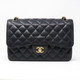 Chanel Classic Jumbo Double Flap Black Quilted Caviar with gold hardware-1653432374