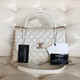 VAN CLEEF 
ARPELS Chanel Coco Handle 20K Iridescent White Quilted Caviar with shiny light gold hardware 