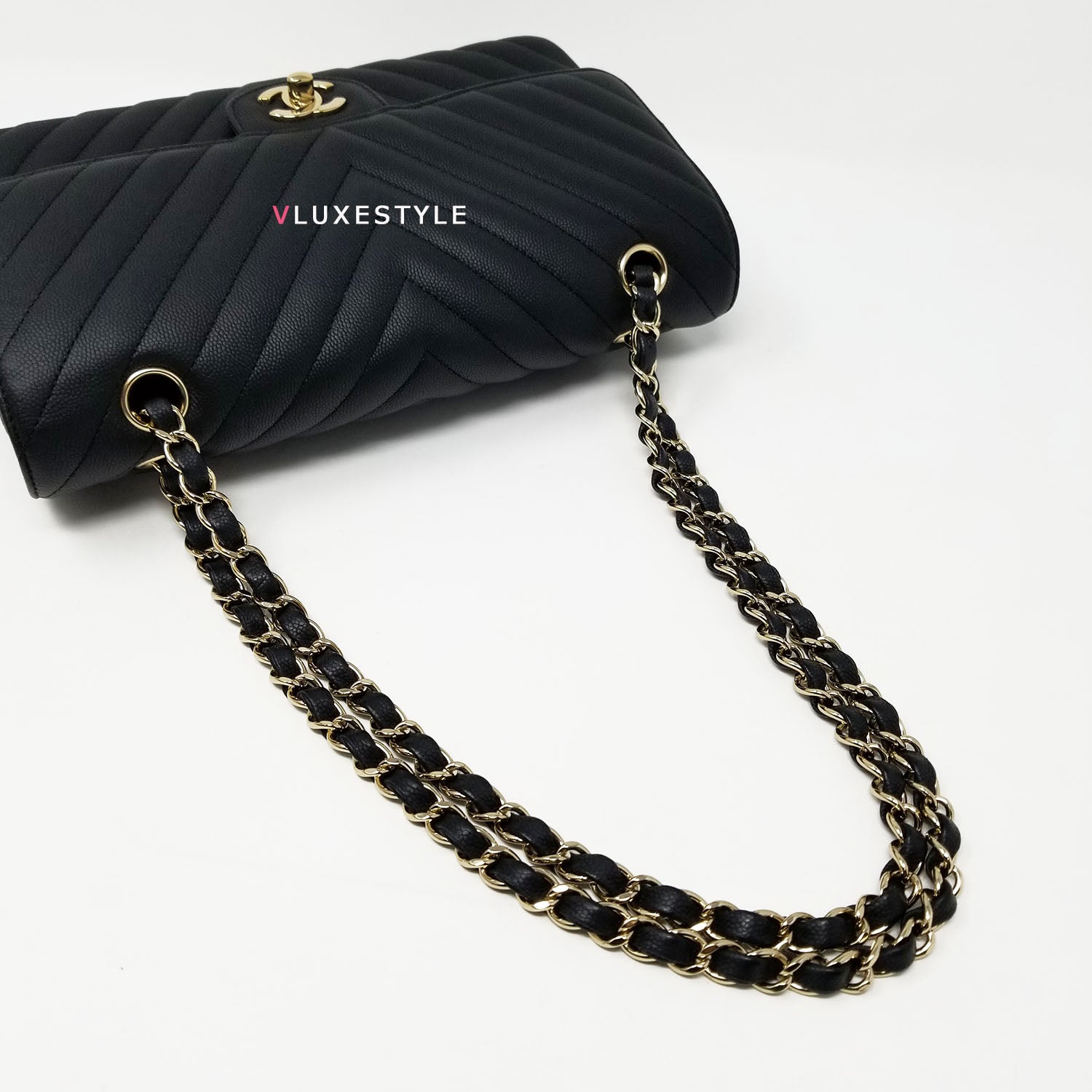 A BLACK CAVIAR LEATHER CHEVRON QUILTED MAXI SINGLE FLAP BAG WITH GOLD  HARDWARE