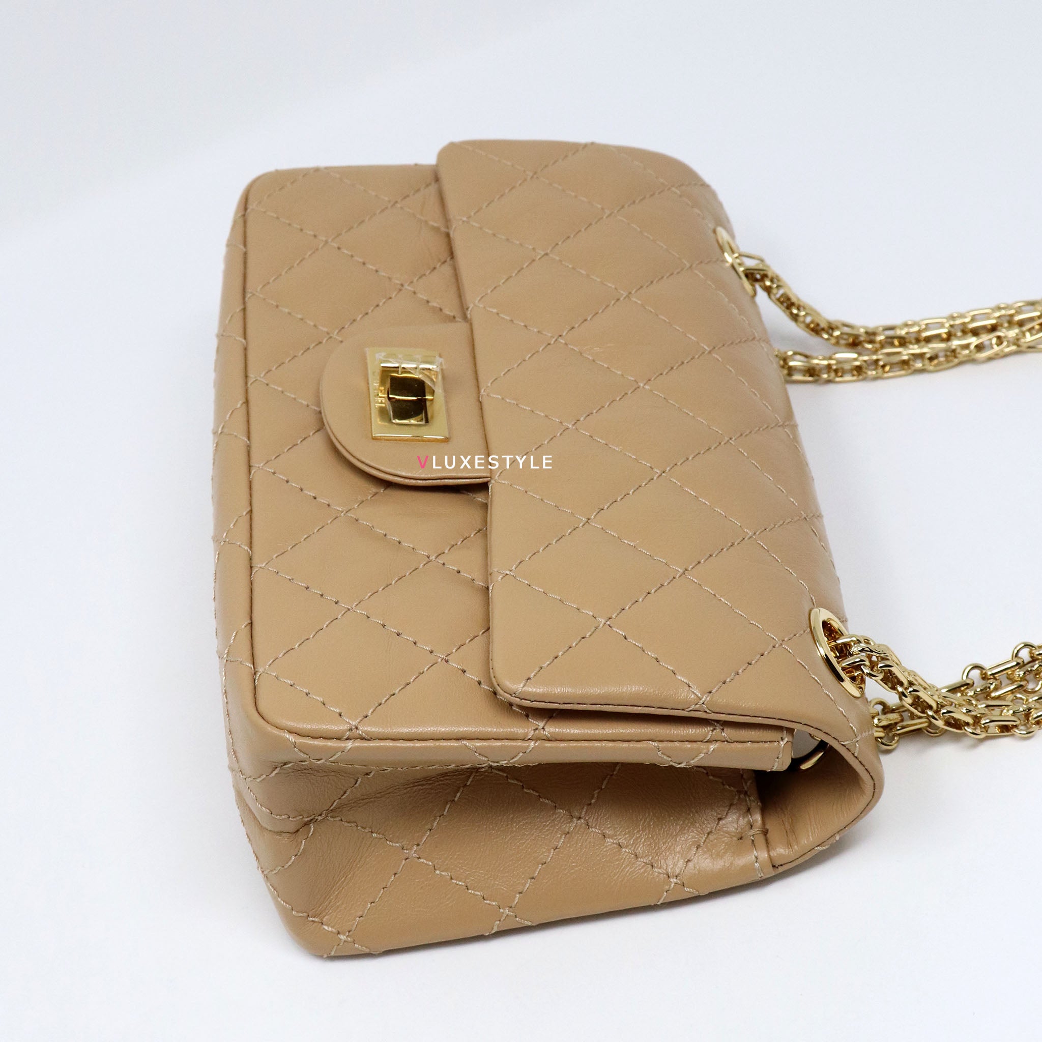 CHANEL- Handbag mini Timeless 18 cm in gold quilted la…