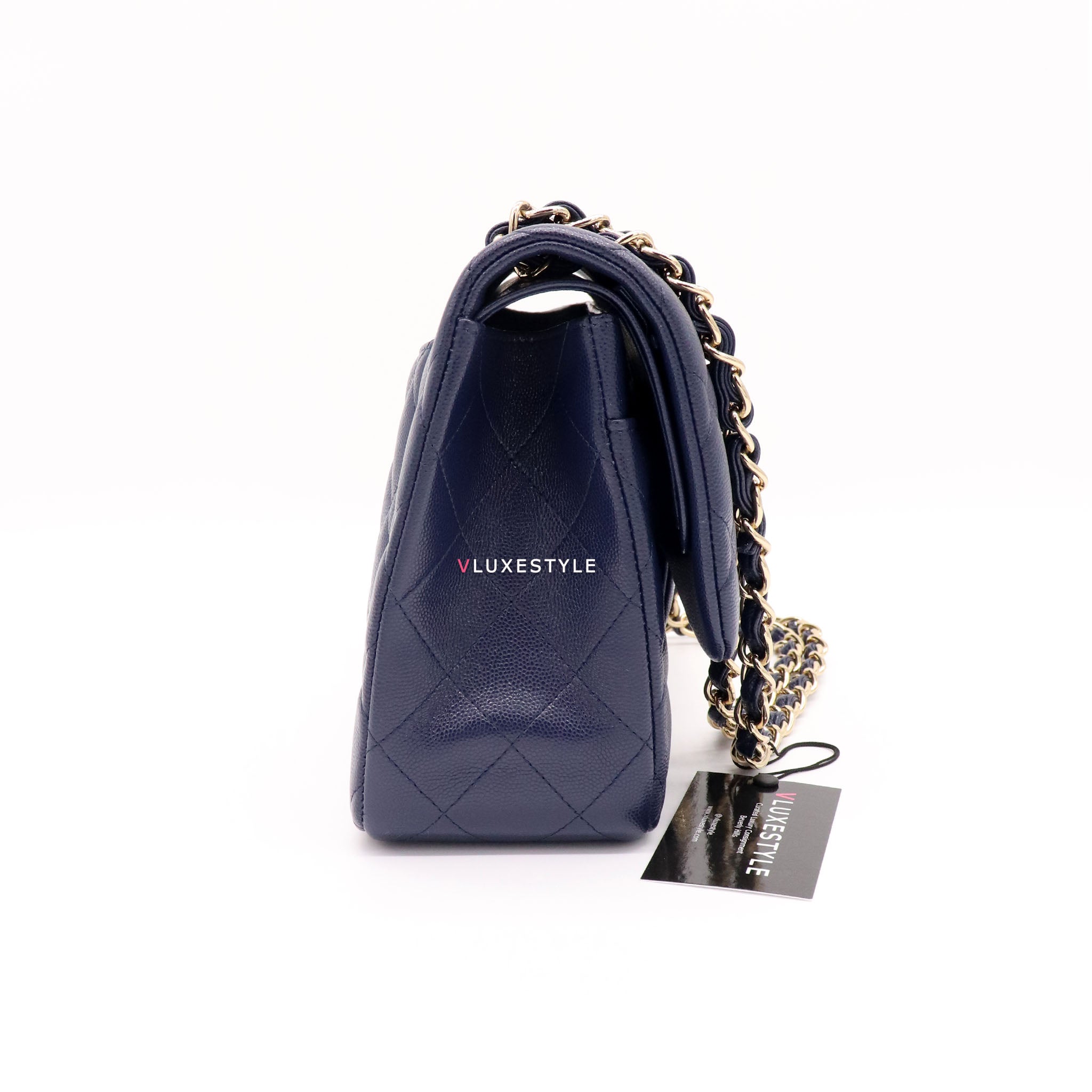 Vintage: Chanel Classic Navy Caviar Leather Jumbo Double Flap with Sil –  The Hangout