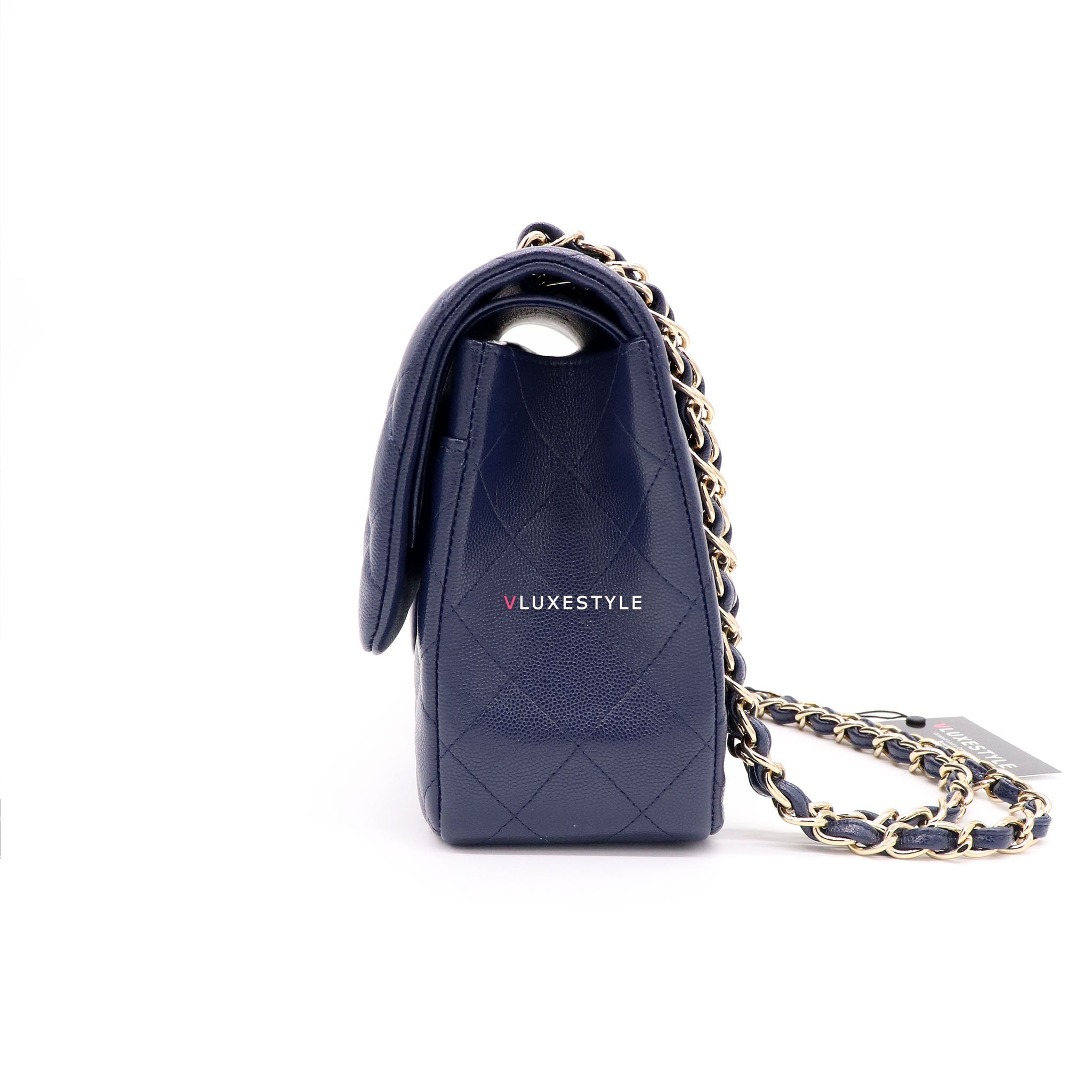 Vintage: Chanel Classic Navy Caviar Leather Jumbo Double Flap with Sil –  The Hangout