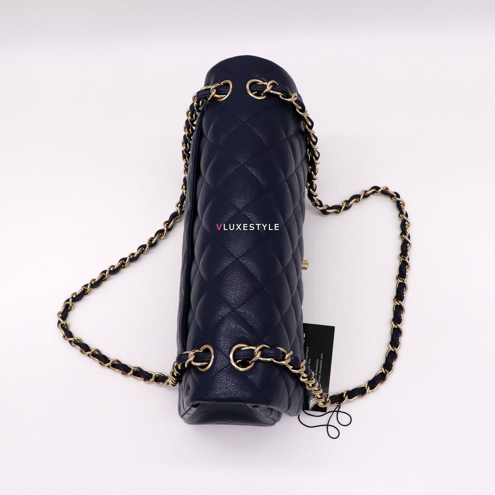 Vintage: Chanel Classic Navy Caviar Leather Jumbo Double Flap with Sil –  The Hangout