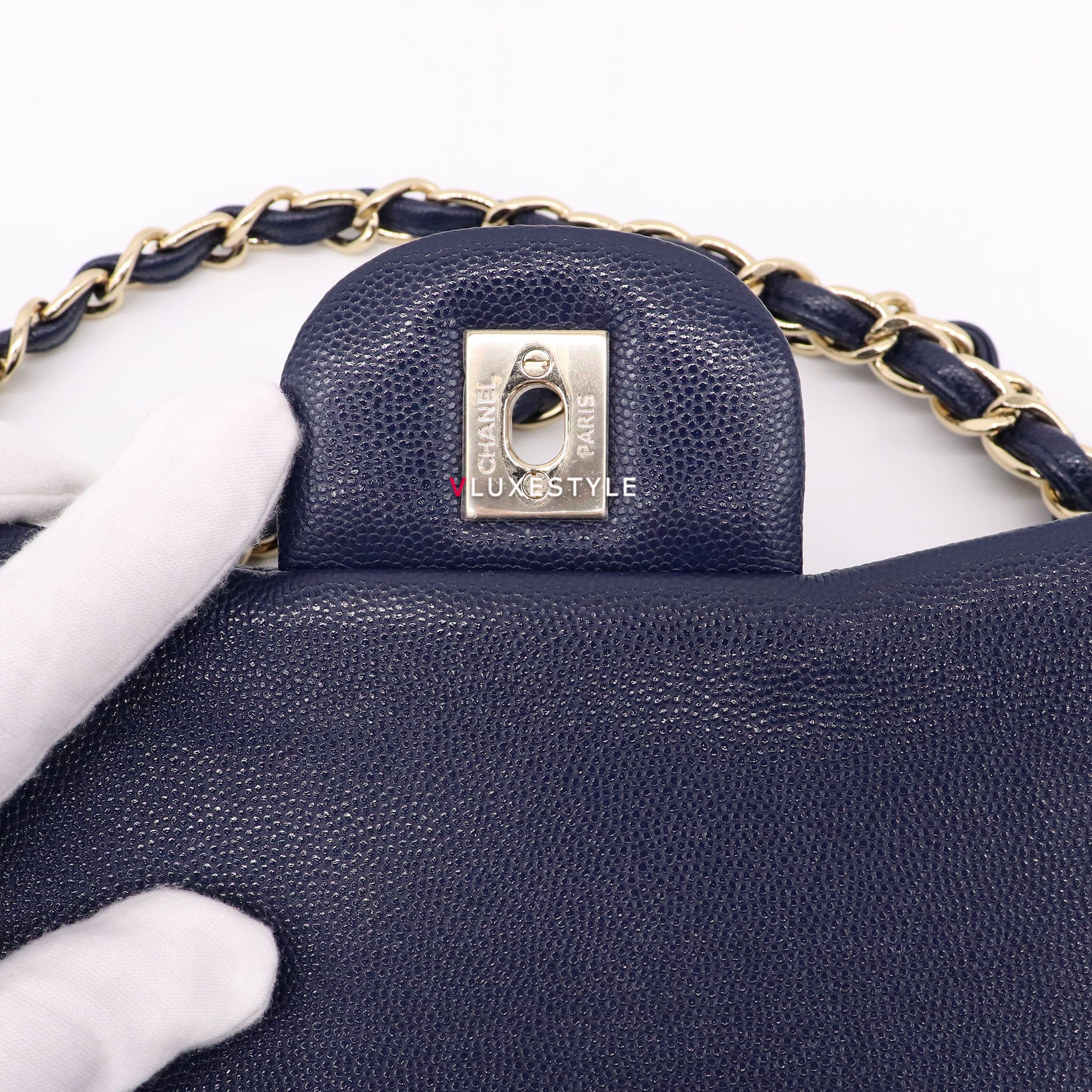 Vintage: Chanel Classic Navy Caviar Leather Jumbo Double Flap with Sil –  The Hangout