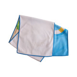 Microfibre beach towel in blue and white, featuring a vibrant design and edged with a blue trim.