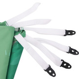 A green outdoor blanket with five white attachment straps at the edges, featuring black clips.