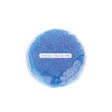 A blue gel cold/hot pack with a textured surface and a logo.