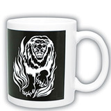 A white coffee mug featuring a black design of a roaring lion amidst stylised flames. It has a logo.