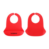 Red silicone bibs with snap closures, featuring a pocket for catching crumbs. Includes a branding logo.