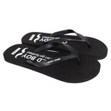 A pair of black EVA classic thongs featuring a textured sole and a logo on the strap.