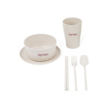 A Wheat Straw Tableware Set in neutral tones, featuring a bowl, plate, drink cup, fork, spoon, and chopsticks.