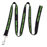 A black polyester dog leash with bright green text and a metal clip for attachment.