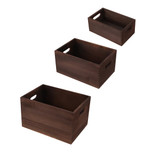 A set of three wooden storage boxes in dark brown, featuring cut-out handles for easy carrying.