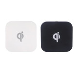 Square-shaped wireless chargers in black and white, featuring a logo on the surface.