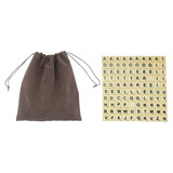 A brown drawstring bag next to a grid of beige letter tiles with black letters arranged in alphabetical order.
