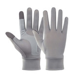 A pair of light grey full finger gloves featuring a textured grip and a logo. Suitable for touchscreen use.