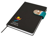 A black A5 notebook with a colourful elastic band and a logo on the cover. Features a ribbon bookmark.