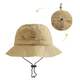 A foldable bucket hat in khaki with a branded logo, featuring a chin strap for secure wear.