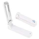A portable UV sterilizer in white, featuring a foldable design with a chrome finish and a logo.