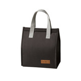 A black minimalist lunch bag with grey handles and a logo patch on the front.