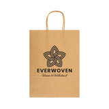 A large brown paper bag with a logo and a patterned design featuring a flower-like shape.