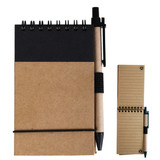 A brown cardboard notebook with a black cover and a black pen attached, featuring spiral binding.