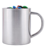 A stainless steel mug filled with colorful M&M's candies.