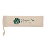 A cream pouch featuring a logo, designed to hold a bamboo straw set.