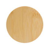 A round bamboo lid for a candle, featuring a smooth surface and natural finish.