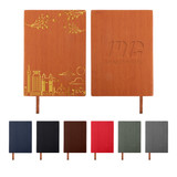 A5 PU leather notebook in various colours, featuring a decorative design on one cover and a logo on the other.