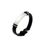 An engraved bracelet with a silver metal centre and black rubber band, featuring a sleek design and logo.