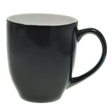 A black coffee mug with a smooth finish and a contrasting light-coloured interior. 