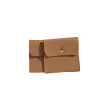 A square, tan PU leather jewelry pouch with a snap closure, featuring a simple design and stitching details.