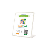 A white NFC Review Stand featuring a logo, QR code, and tap instructions, with decorative border accents.