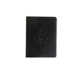 A black PU leather passport holder featuring an embossed design and a logo on the front.