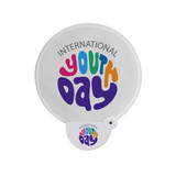 A white foldable fan featuring colourful text that reads "International Youth Day" in vibrant lettering.