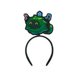 A custom felt headband featuring a green character with musical notes and flowers, set on a black band.