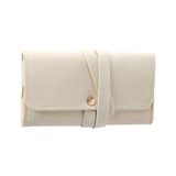 A synthetic leather jewellery bag in a soft cream colour, featuring a secure closure and a sleek design.