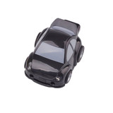 A black car-shaped flash drive with detailed features and wheels, designed for tech storage.