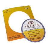 A yellow and white magnetic photo frame with a circular insert featuring a logo and contact information.